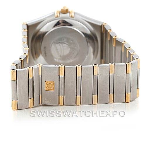 The image shows the back case and bracelet of the Omega Constellation 1302.30.00 Men's Steel and Gold (two tone) Silver Dial 1302.30.00 Men's Steel and Gold (two tone) Silver Dial watch, highlighting the logo and clasp.