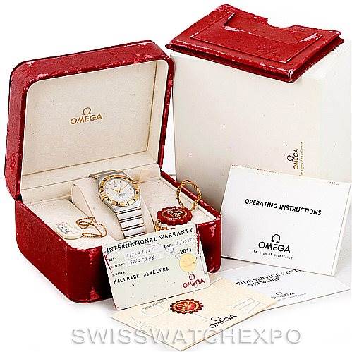 The Omega Constellation 1302.30.00 Men's Steel and Gold (two tone) Silver Dial 1302.30.00 Men's Steel and Gold (two tone) Silver Dial watch is displayed at an angled view, showing the box, warranty card, operating instructions, and accessories.
