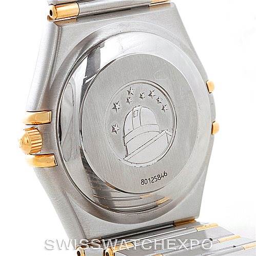 The image shows the case back of the Omega Constellation 1302.30.00 Men's Steel and Gold (two tone) Silver Dial 1302.30.00 Men's Steel and Gold (two tone) Silver Dial watch, featuring the signature observatory medallion with stars.