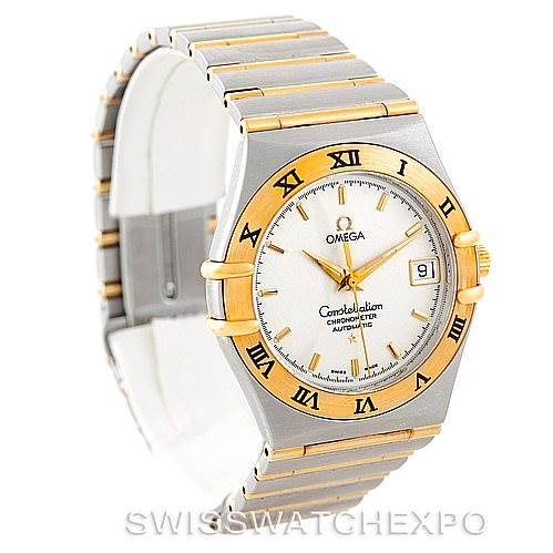 This image shows a side-angle view of the Omega Constellation 1202.30.00 Men's Steel and Gold (two tone) Silver Dial 1202.30.00 Men's Steel and Gold (two tone) Silver Dial watch, highlighting its face, bracelet, and bezel.