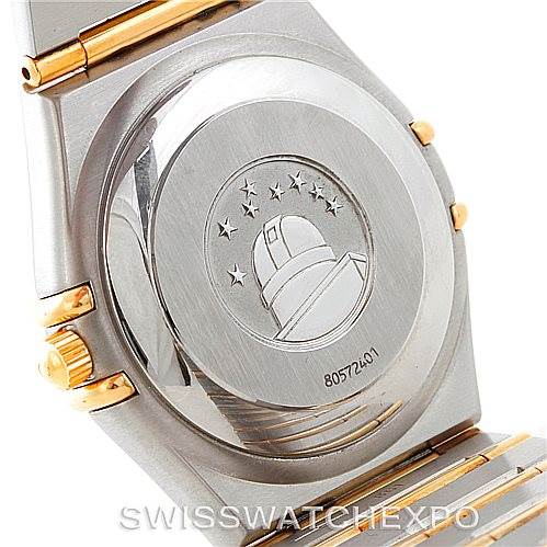 This image shows the case back of the Omega Constellation 1202.30.00 Men's Steel and Gold (two tone) Silver Dial 1202.30.00 Men's Steel and Gold (two tone) Silver Dial watch, highlighting its emblem and integrated bracelet.