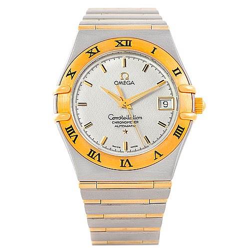 The image shows a front angle of the Omega Constellation 1202.30.00 Men
s Steel and Gold (two tone) Silver Dial 1202.30.00 Men
s Steel and Gold (two tone) Silver Dial watch, highlighting its dial, bracelet, and date display.