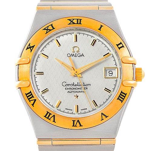 The image shows a frontal view of the Omega Constellation 1202.30.00 Men
s Steel and Gold (two tone) Silver Dial 1202.30.00 Men
s Steel and Gold (two tone) Silver Dial watch, highlighting its dial, bezel, and bracelet.