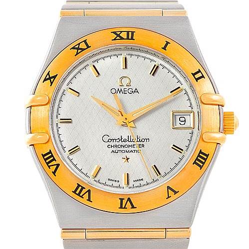 The image shows a front view of the Omega Constellation 1202.30.00 Men's Steel and Gold (two tone) Silver Dial 1202.30.00 Men's Steel and Gold (two tone) Silver Dial watch, featuring its dial, bezel, and a portion of the bracelet.