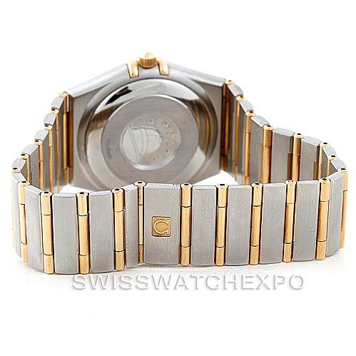 The image shows the back of an Omega Constellation 1202.30.00 Men's Steel and Gold (two tone) Silver Dial 1202.30.00 Men's Steel and Gold (two tone) Silver Dial watch, highlighting its metal bracelet and case back.