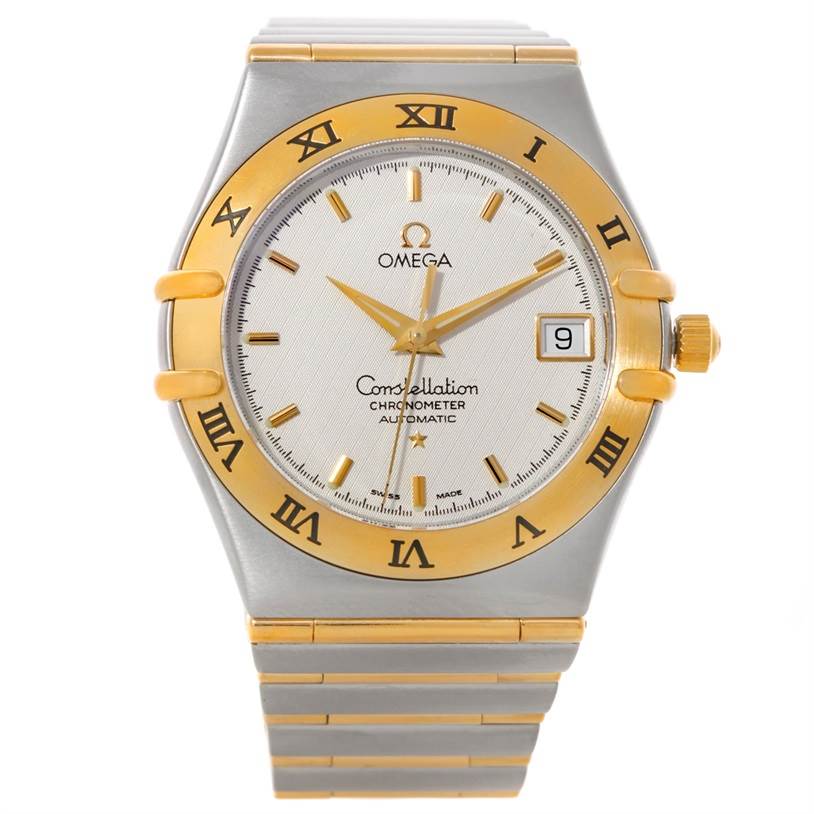 The image shows a front view of the Omega Constellation 1202.30.00 Men
s Steel and Gold (two tone) Silver Dial 1202.30.00 Men
s Steel and Gold (two tone) Silver Dial watch, highlighting its face, bezel, Roman numerals, hands, date window, and bracelet.