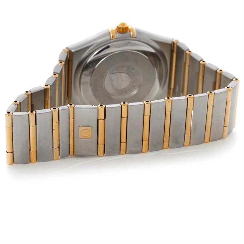 The image shows the back view of an Omega Constellation 1202.30.00 Men
s Steel and Gold (two tone) Silver Dial 1202.30.00 Men
s Steel and Gold (two tone) Silver Dial watch, highlighting the case back and two-tone metal bracelet.