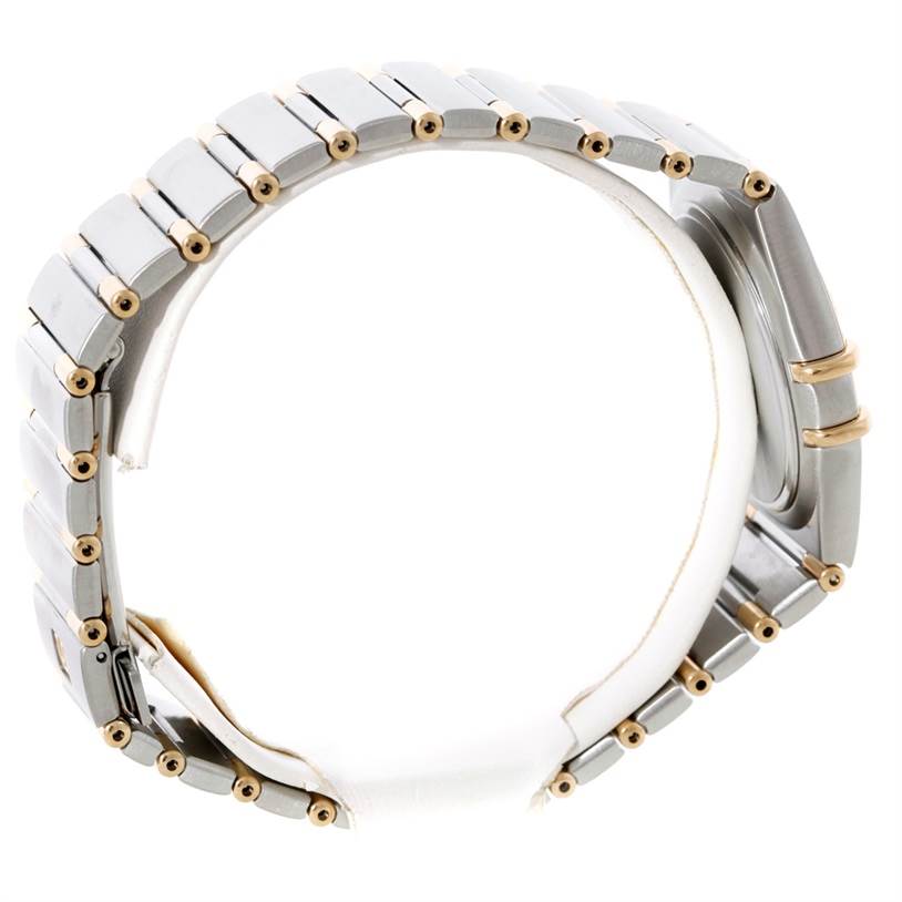 The image shows a side view of the Omega Constellation 1312.30.00 Men's Steel and Gold (two tone) Silver Dial 1312.30.00 Men's Steel and Gold (two tone) Silver Dial watch, focusing on the bracelet and part of the case.