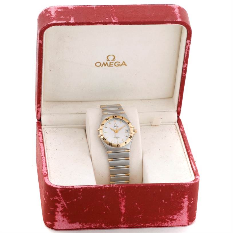 The image depicts an Omega Constellation 1312.30.00 Men's Steel and Gold (two tone) Silver Dial 1312.30.00 Men's Steel and Gold (two tone) Silver Dial watch in a red Omega-branded box, shown from the front.