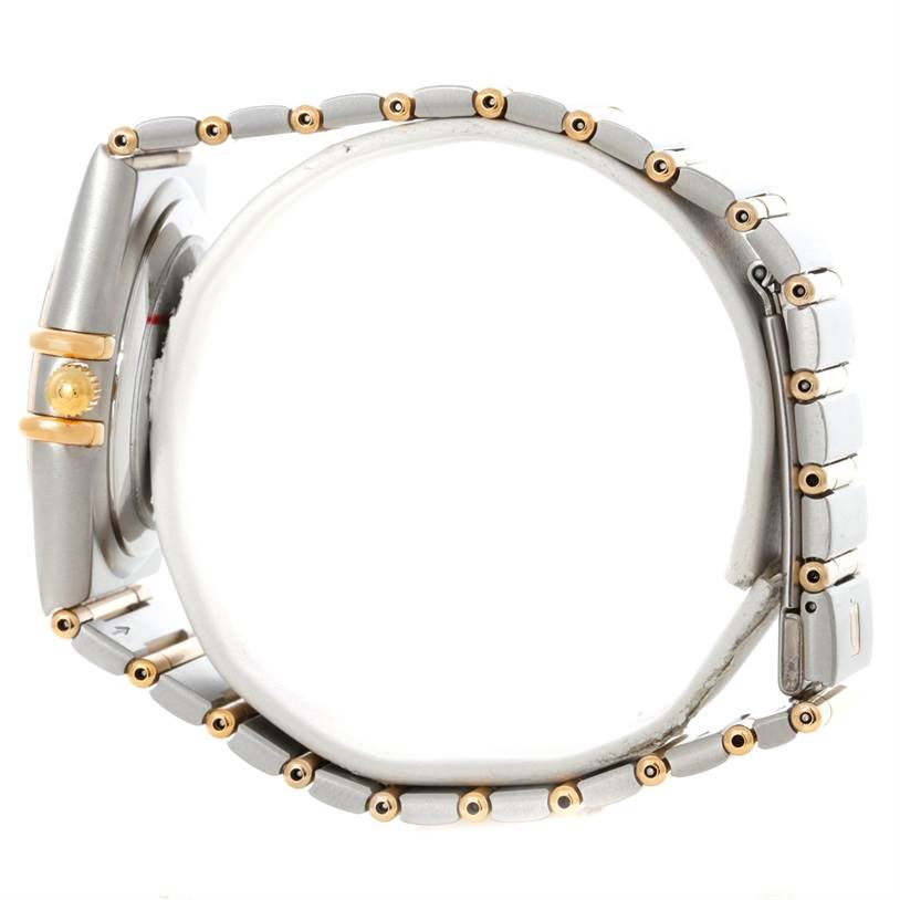 The image shows a side profile of the Omega Constellation 1252.30.00 Men's Steel and Gold (two tone) Silver Dial 1252.30.00 Men's Steel and Gold (two tone) Silver Dial watch, focusing on the bracelet and crown.