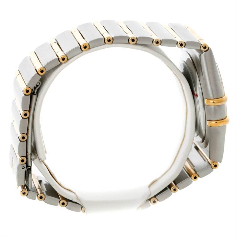 This side profile view of the Omega Constellation 1252.30.00 Men's Steel and Gold (two tone) Silver Dial 1252.30.00 Men's Steel and Gold (two tone) Silver Dial watch showcases its bracelet and case body.