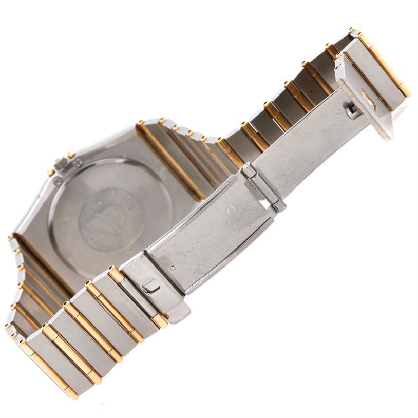 This image shows the clasp and backside of the bracelet for the Omega Constellation Men's Steel and Gold (two tone) Champagne Dial Men's Steel and Gold (two tone) Champagne Dial watch in a partially open position.