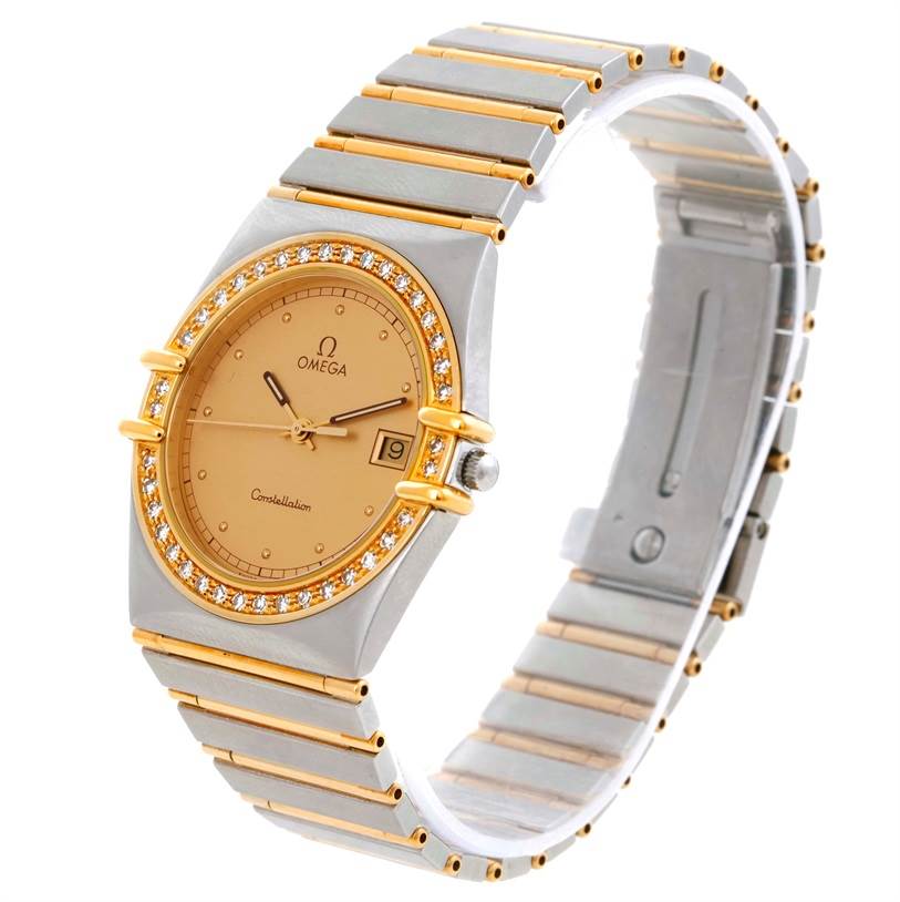 The image shows a side angle view of the Omega Constellation Men's Steel and Gold (two tone) Champagne Dial Men's Steel and Gold (two tone) Champagne Dial watch, highlighting its band, bezel, dial, and date window.
