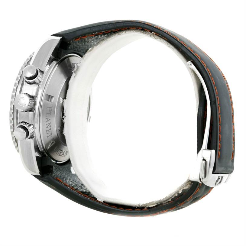 This side view of the Omega Planet Ocean 2210.51.00 Men
s Stainless Steel Black Dial 2210.51.00 Men
s Stainless Steel Black Dial watch shows the buckle, strap, case back, and crown.