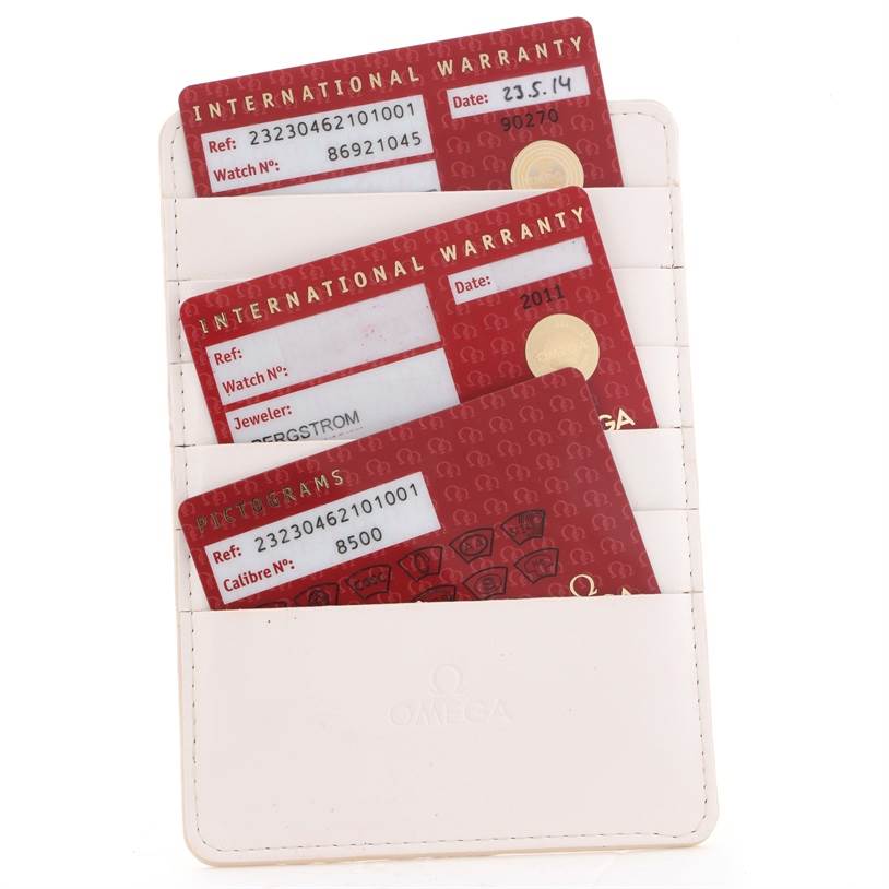 The image shows the international warranty cards and a cardholder for the Omega Planet Ocean 232.30.46.21.01.003 Men's Stainless Steel Black Dial 232.30.46.21.01.003 Men's Stainless Steel Black Dial model.