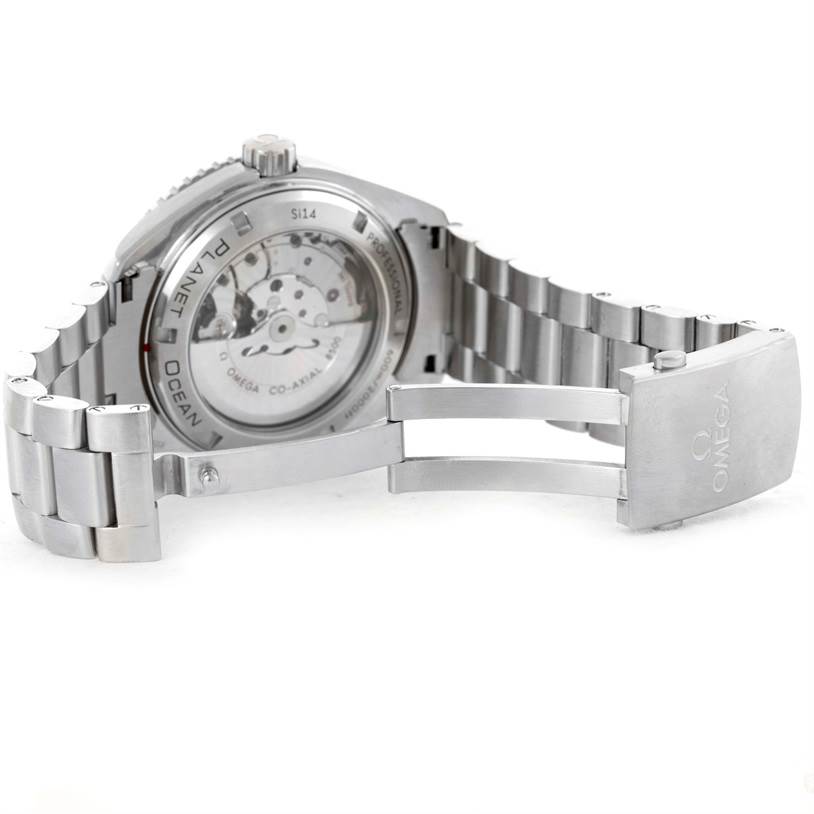 This image shows the open back and deployment clasp of a Planet Ocean model by Omega, highlighting the movement and bracelet.