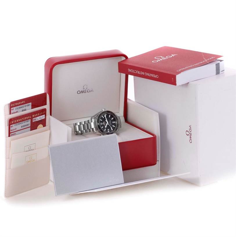 The Omega Planet Ocean 232.30.42.21.01.001 Men
s Stainless Steel Black Dial 232.30.42.21.01.001 Men
s Stainless Steel Black Dial watch is shown in its open box, accompanied by documentation and an instruction manual.