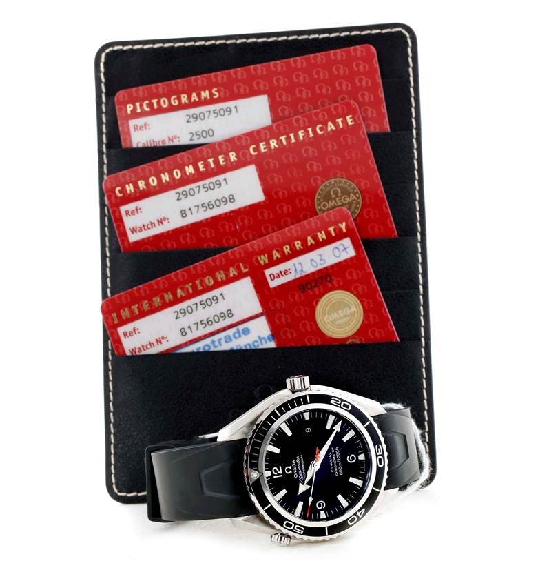 The Omega Planet Ocean 2907.50.91 Men
s Stainless Steel Black Dial 2907.50.91 Men
s Stainless Steel Black Dial watch is shown from an angle displaying its face, alongside its warranty and certification cards.