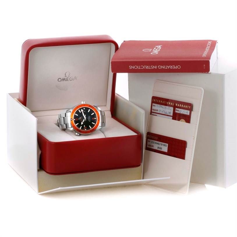 The Omega Planet Ocean 232.30.46.21.01.002 Men
s Stainless Steel Black Dial 232.30.46.21.01.002 Men
s Stainless Steel Black Dial watch is shown in its box, accompanied by warranty cards and an instruction manual.