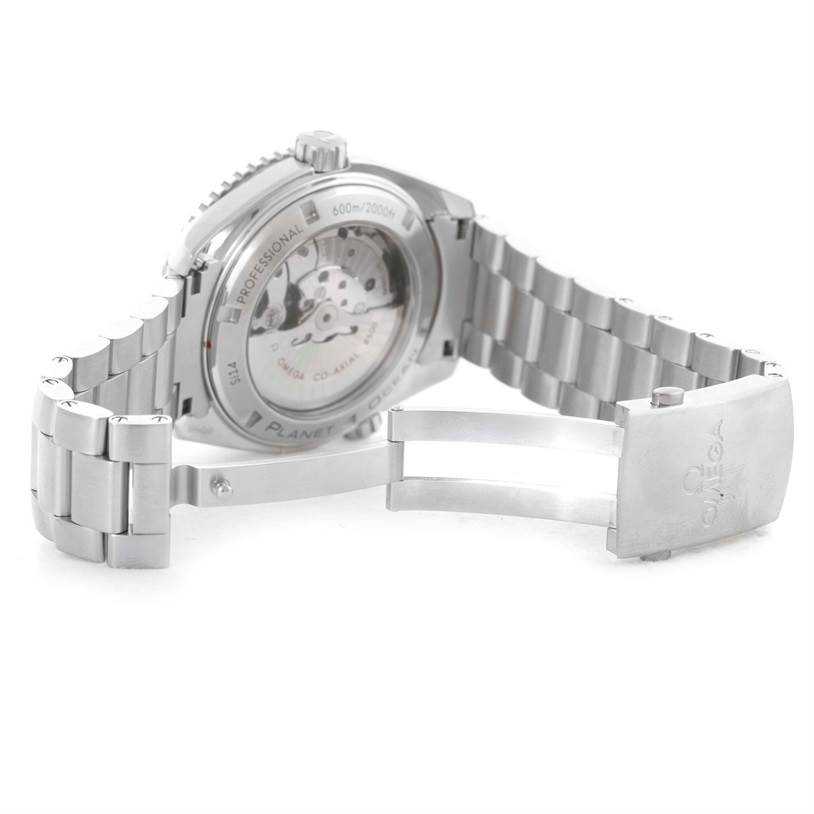 The Omega Planet Ocean 232.30.46.21.01.002 Men
s Stainless Steel Black Dial 232.30.46.21.01.002 Men
s Stainless Steel Black Dial watch is shown from the back, highlighting its caseback and opened stainless steel bracelet.