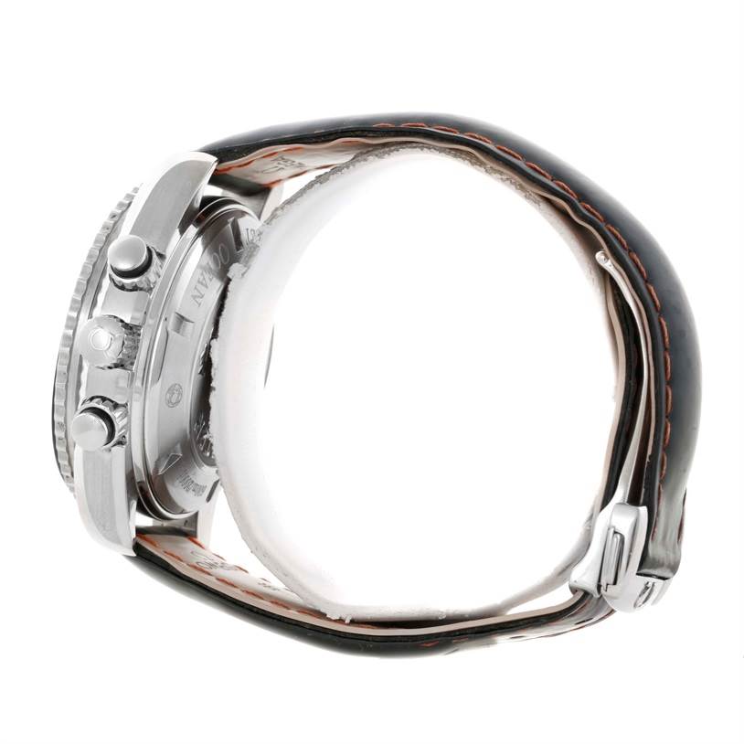 This side view of the Omega Planet Ocean 2210.51.00 Men
s Stainless Steel Black Dial 2210.51.00 Men
s Stainless Steel Black Dial watch shows the case, pushers, crown, and leather strap with orange stitching.