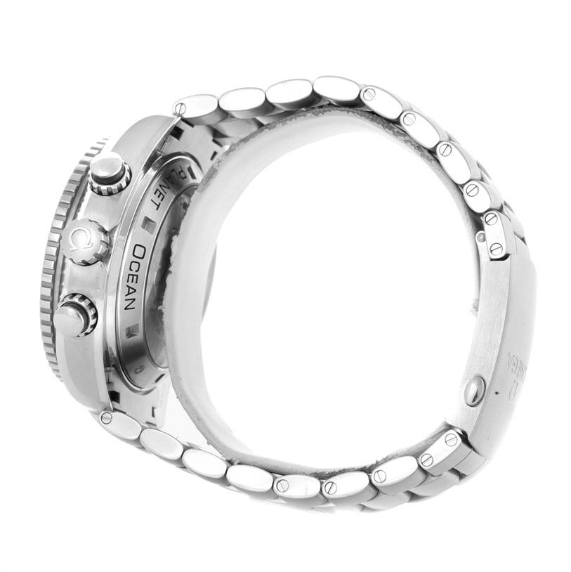 This side view of the Omega Planet Ocean 232.30.46.51.01.001 Men
s Stainless Steel Black Dial 232.30.46.51.01.001 Men
s Stainless Steel Black Dial watch shows the crown, pushers, and a segment of the bracelet.