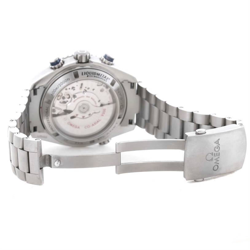 The image shows the back view of the Omega Planet Ocean 232.90.46.51.03.001 Men
s Titanium Blue Dial 232.90.46.51.03.001 Men
s Titanium Blue Dial watch, highlighting the case back, clasp, and part of the bracelet.