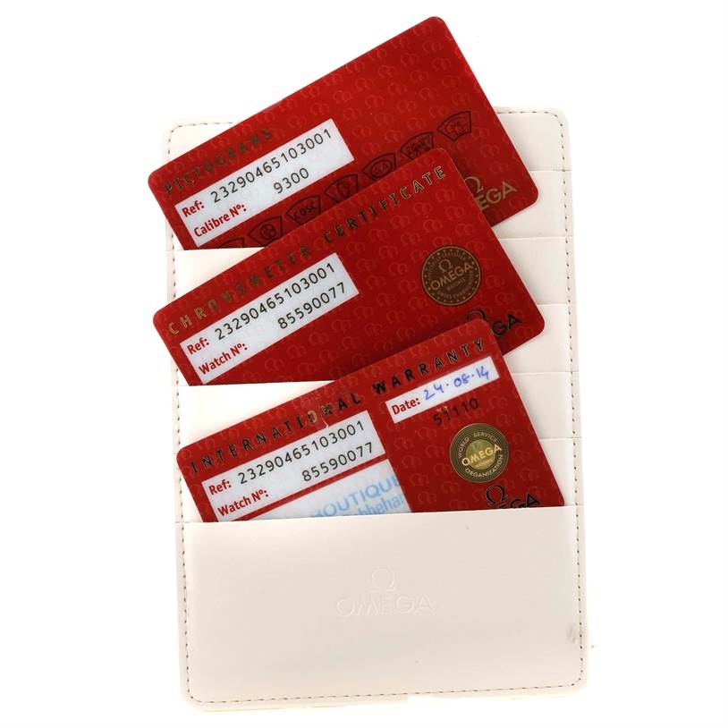 The image shows the warranty cards and certificates for an Omega Planet Ocean 232.90.46.51.03.001 Men
s Titanium Blue Dial 232.90.46.51.03.001 Men
s Titanium Blue Dial watch.