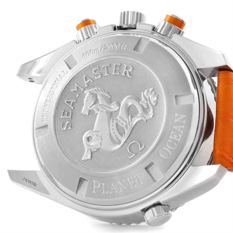This image shows the back case of the Omega Seamaster Planet Ocean watch, highlighting the branding and decorative engraving.