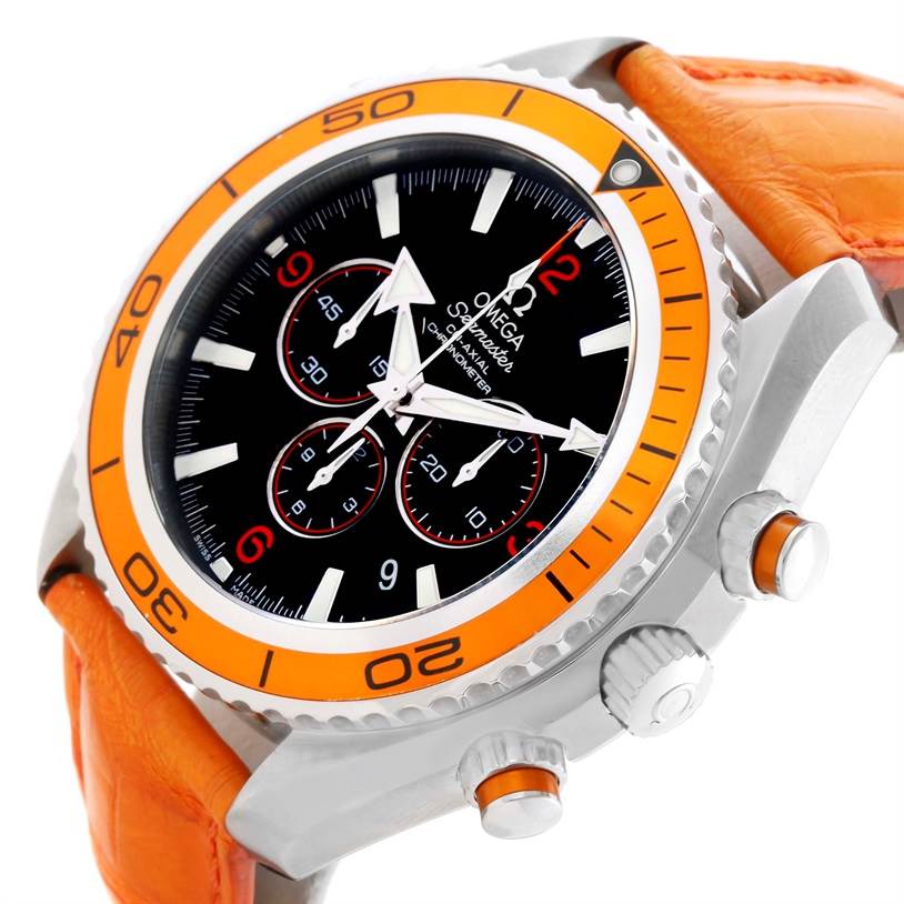 This Omega Planet Ocean 2918.50.38 Men
s Stainless Steel Black Dial 2918.50.38 Men
s Stainless Steel Black Dial watch is shown from the front-left angle, highlighting its orange bezel, chronograph dials, and orange strap.