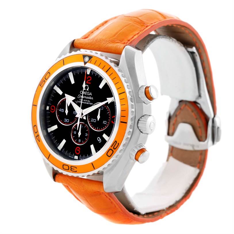 The image shows an Omega Planet Ocean 2918.50.38 Men
s Stainless Steel Black Dial 2918.50.38 Men
s Stainless Steel Black Dial watch at a three-quarter angle, highlighting its orange bezel and strap, along with the chronograph dials.
