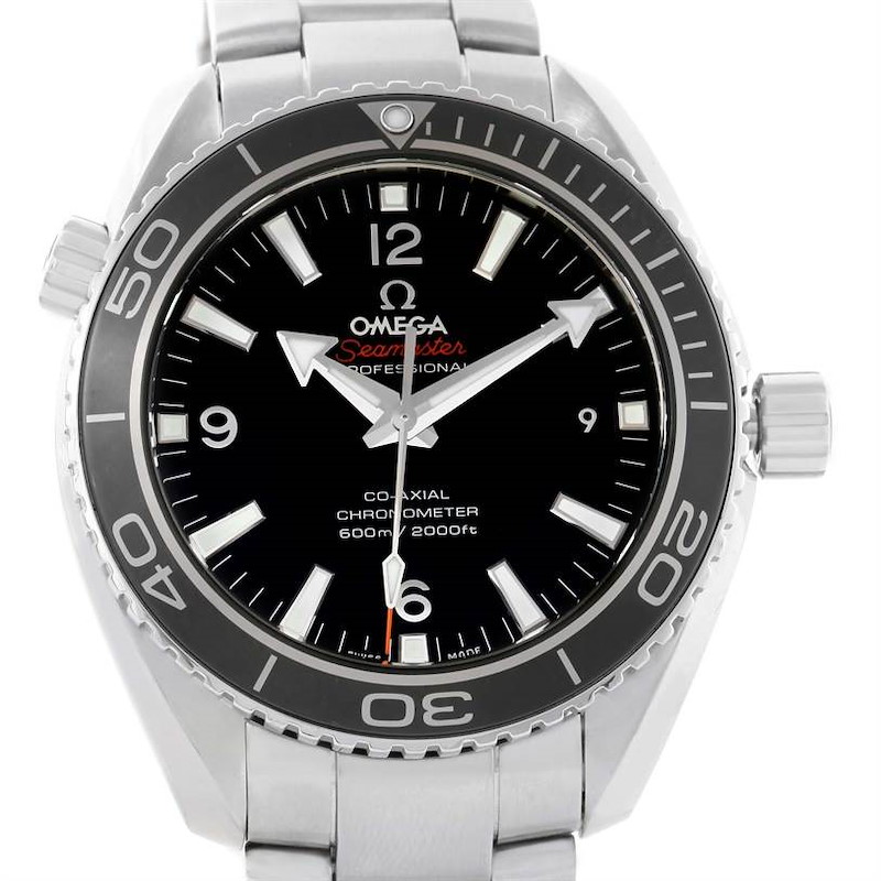 The image shows a front view of the Omega Planet Ocean Seamaster watch with a black dial, silver bezel, and stainless steel bracelet.