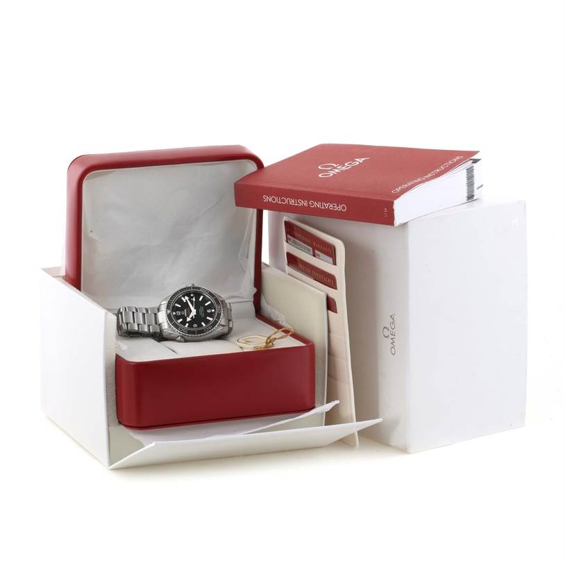 The Omega Planet Ocean 232.30.42.21.01.001 Men
s Stainless Steel Black Dial 232.30.42.21.01.001 Men
s Stainless Steel Black Dial watch is displayed in its box with booklets and manuals beside it.