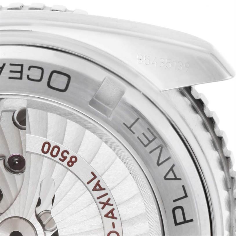 The image shows a close-up of the Omega Planet Ocean 232.30.42.21.01.001 Men
s Stainless Steel Black Dial 232.30.42.21.01.001 Men
s Stainless Steel Black Dial watch, highlighting the bezel, crown, and part of the dial and case back.