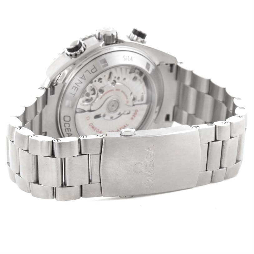 The image shows the back and side of the Omega Planet Ocean 232.30.46.51.01.001 Men
s Stainless Steel Black Dial 232.30.46.51.01.001 Men
s Stainless Steel Black Dial watch, highlighting the bracelet, deployment clasp, and exhibition case back.