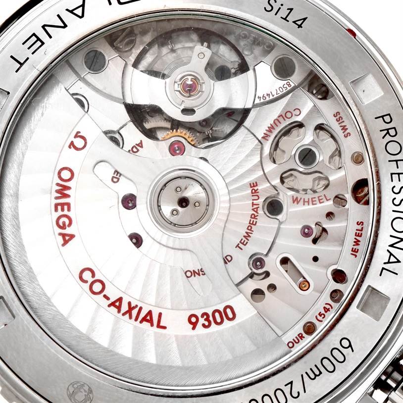 This image shows a close-up view of the movement and inner workings of the Omega Planet Ocean 232.30.46.51.01.003 Men
s Stainless Steel Black Dial 232.30.46.51.01.003 Men
s Stainless Steel Black Dial Co-Axial 9300 watch.