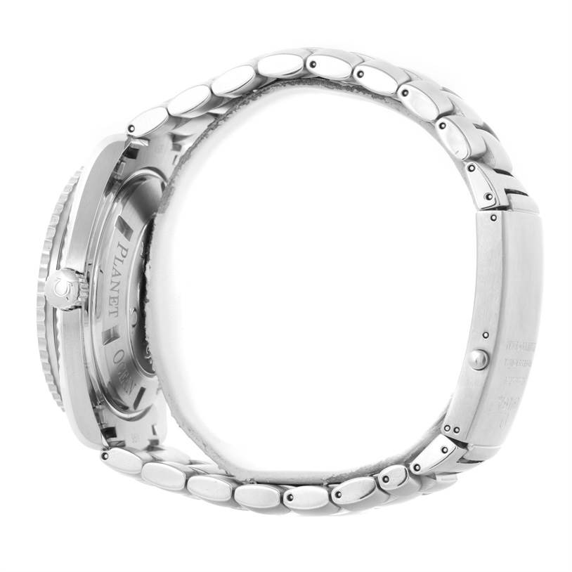 The image shows a side view of an Omega Planet Ocean 2200.50.00 Men
s Stainless Steel Black Dial 2200.50.00 Men
s Stainless Steel Black Dial watch, highlighting its stainless steel bracelet and caseback.