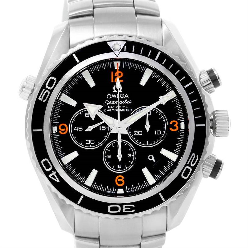 The image shows the front view of an Omega Planet Ocean watch with a stainless steel band and chronograph dials.