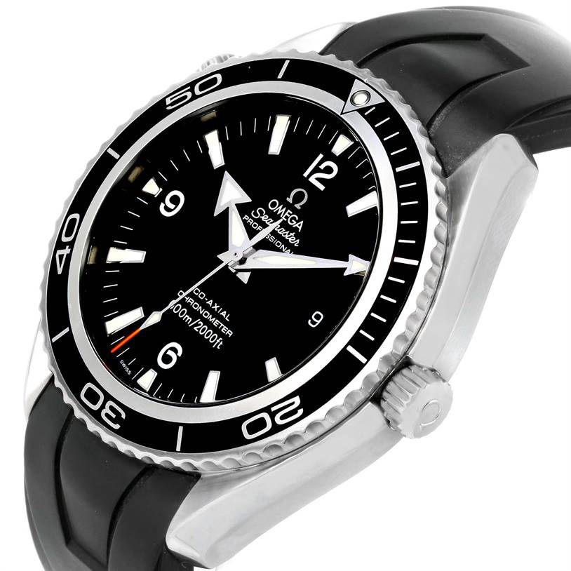 The image shows an Omega Seamaster Planet Ocean watch at an angled view, displaying the face, bezel, crown, and part of the strap.