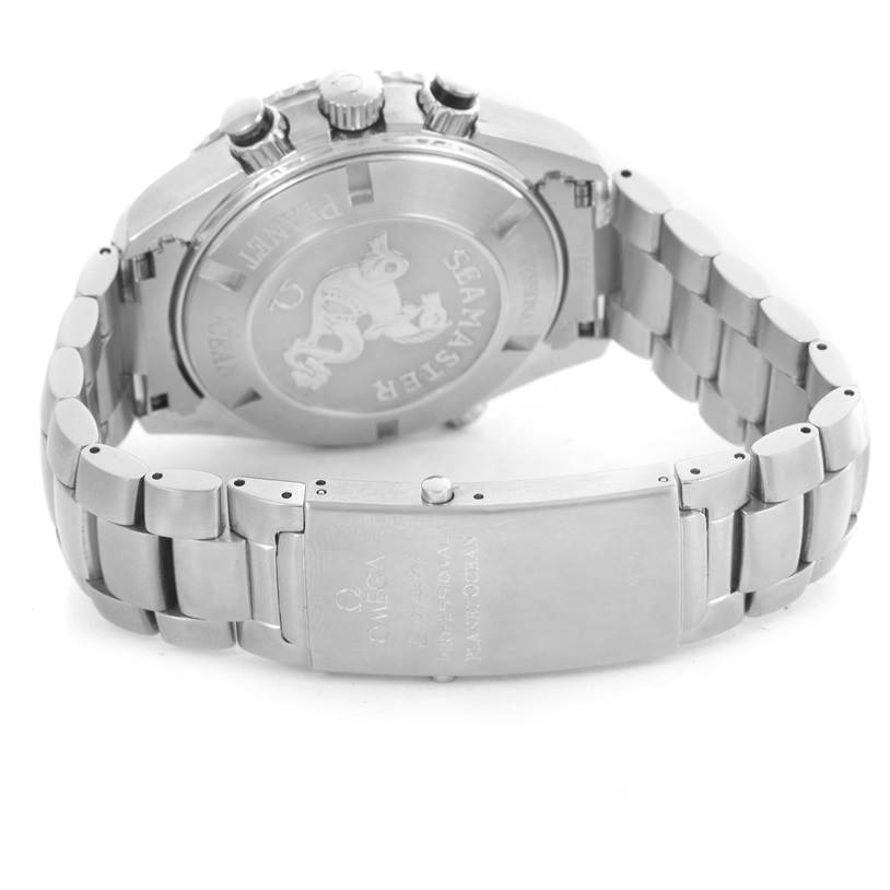 The image shows the back case and metal bracelet clasp of the Omega Seamaster Planet Ocean watch.