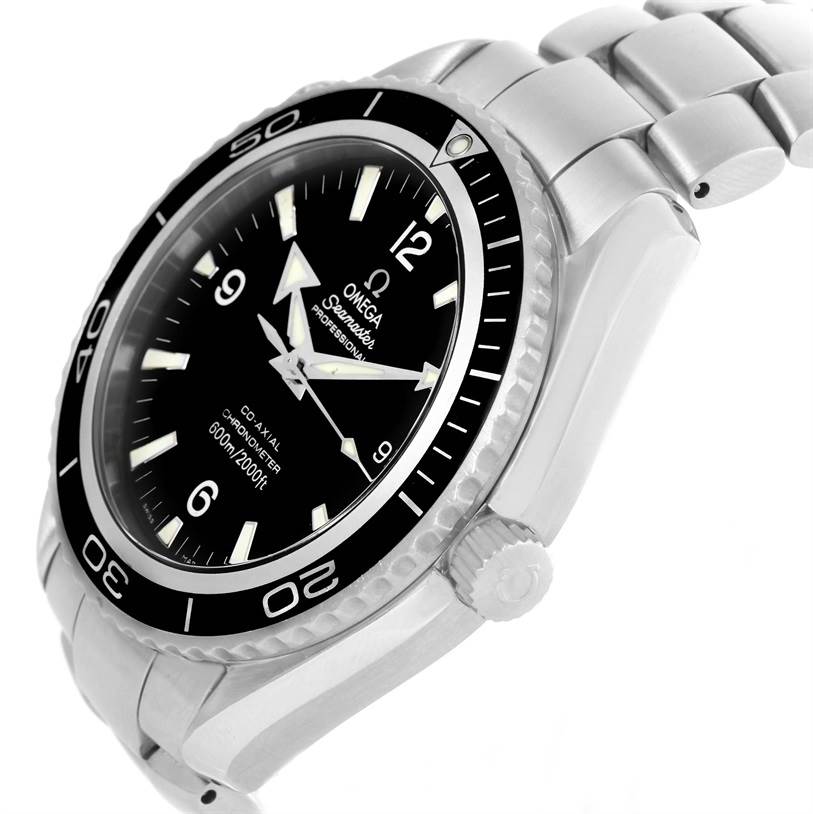 The image shows an angled view of an Omega Seamaster Planet Ocean watch, highlighting the bezel, crown, bracelet, and face.