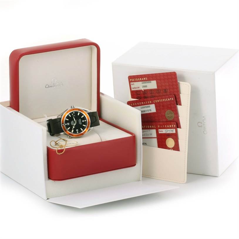 The Omega Planet Ocean 2200.50.00 Men
s Stainless Steel Black Dial 2200.50.00 Men
s Stainless Steel Black Dial watch is shown at an angled display inside its box, with an orange bezel, black strap, and accompanying documents.