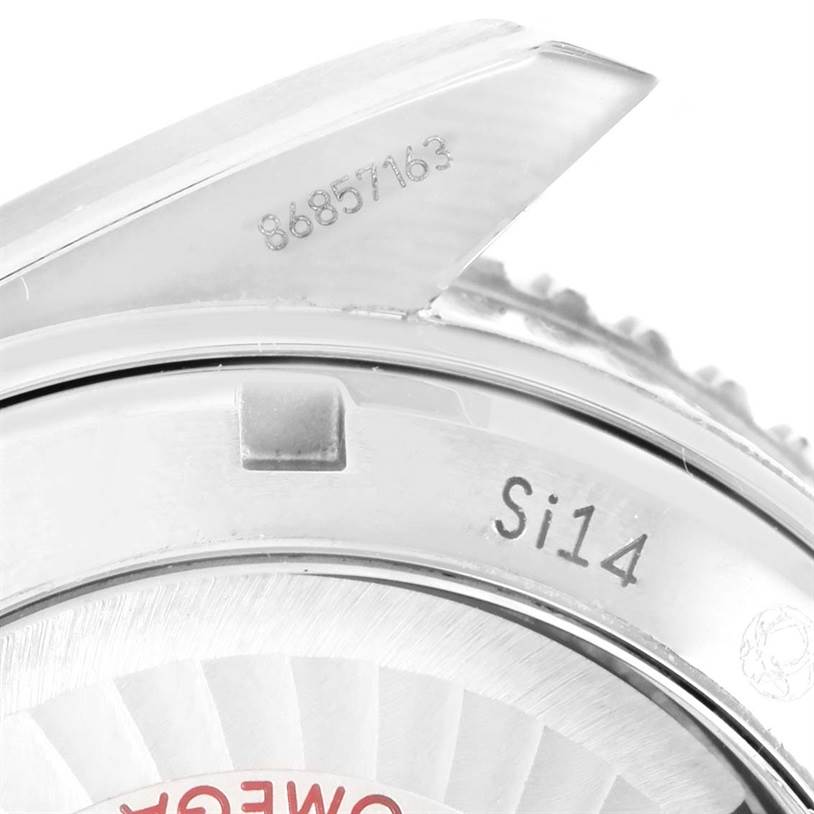 This image shows a close-up of the back case and the side of the bezel of the Omega Planet Ocean 232.30.44.22.01.001 Men
s Stainless Steel Black Dial 232.30.44.22.01.001 Men
s Stainless Steel Black Dial watch, featuring model numbers.