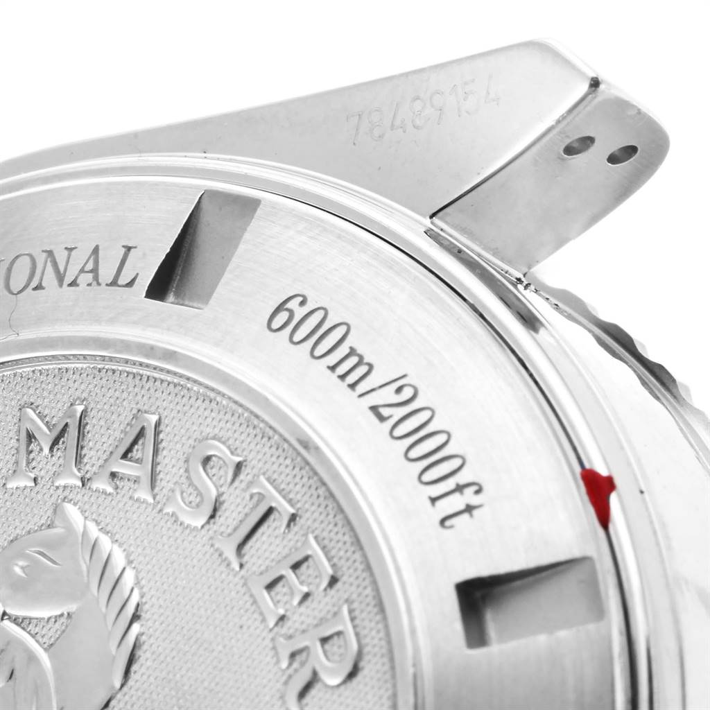 The image shows the back case of an Omega Planet Ocean 2210.50.00 Men
s Stainless Steel Black Dial 2210.50.00 Men
s Stainless Steel Black Dial watch, highlighting its water resistance rating and part of the clasp.