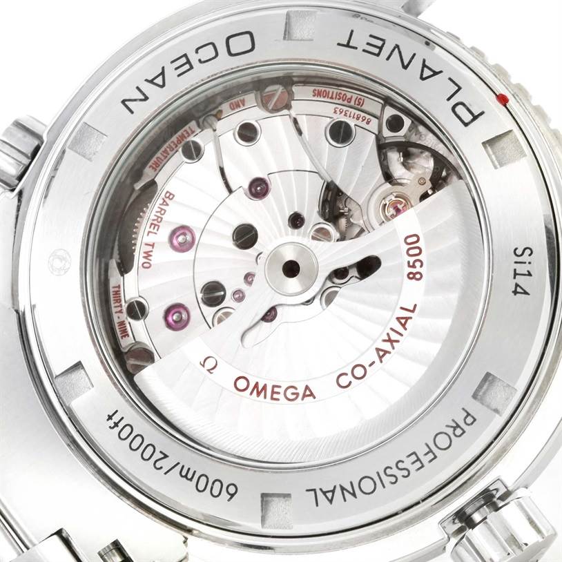 The image shows the back of an Omega Planet Ocean 232.30.46.21.01.001 Men
s Stainless Steel Black Dial 232.30.46.21.01.001 Men
s Stainless Steel Black Dial watch, highlighting its Co-Axial 8500 movement.