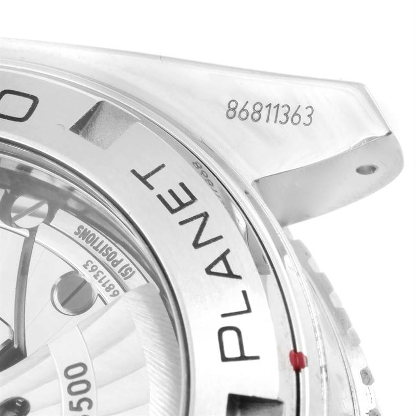 The image shows a close-up of the bezel and part of the case of the Omega Planet Ocean 232.30.46.21.01.001 Men
s Stainless Steel Black Dial 232.30.46.21.01.001 Men
s Stainless Steel Black Dial watch, highlighting the serial number.