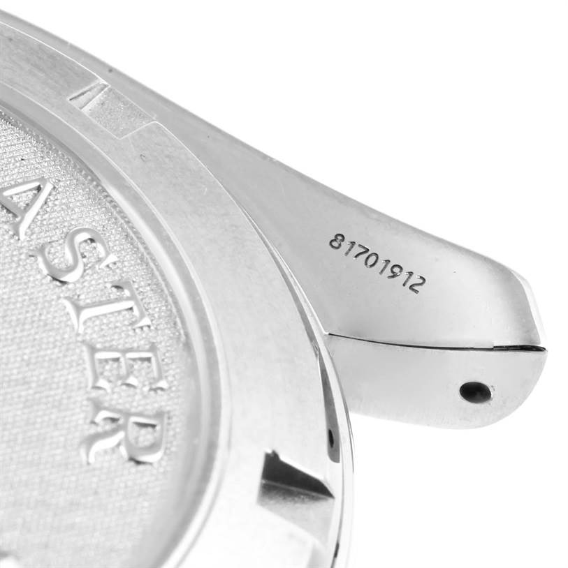 The image shows a close-up angle of the back case and a part of the lug of an Omega Planet Ocean 2209.50.00 Men
s Stainless Steel Black Dial 2209.50.00 Men
s Stainless Steel Black Dial watch.