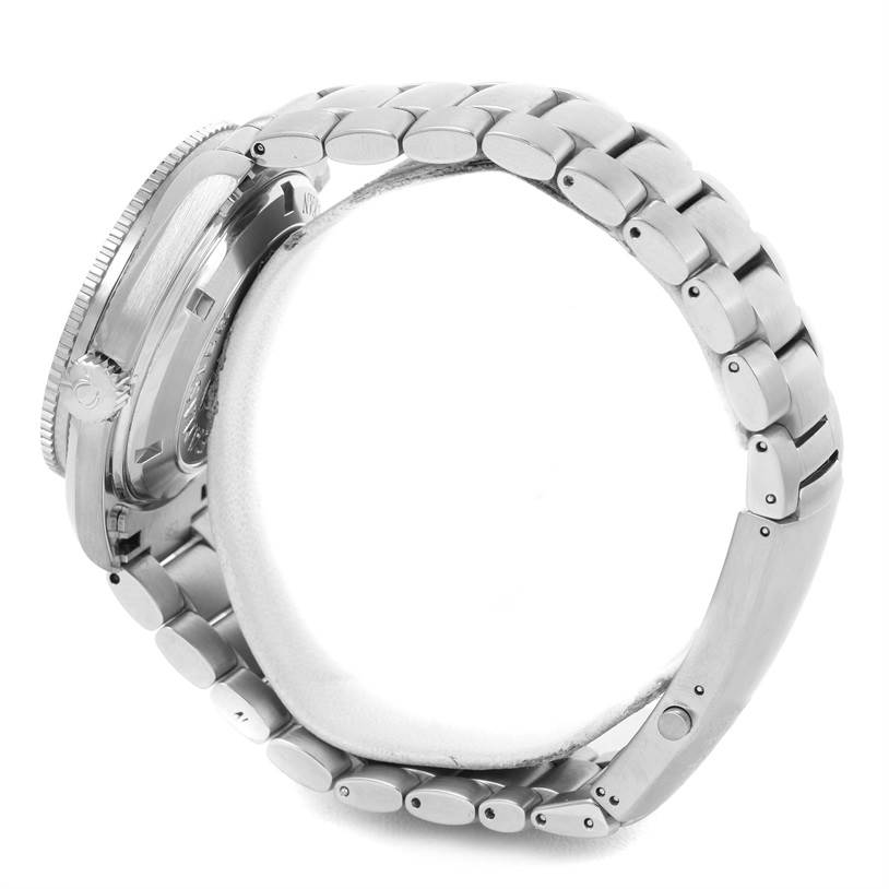 The image shows a side view of the Omega Planet Ocean 2209.50.00 Men
s Stainless Steel Black Dial 2209.50.00 Men
s Stainless Steel Black Dial watch, focusing on the case, crown, and the metal bracelet.