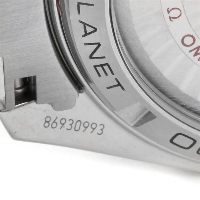 This close-up image shows the case back of the Omega Planet Ocean 232.30.42.21.01.001 Men
s Stainless Steel Black Dial 232.30.42.21.01.001 Men
s Stainless Steel Black Dial watch, highlighting part of the serial number and model engraving.