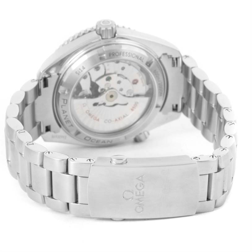 The image shows the back and part of the bracelet of the Omega Planet Ocean 232.30.42.21.01.001 Men
s Stainless Steel Black Dial 232.30.42.21.01.001 Men
s Stainless Steel Black Dial watch, highlighting its clasp and transparent case back.